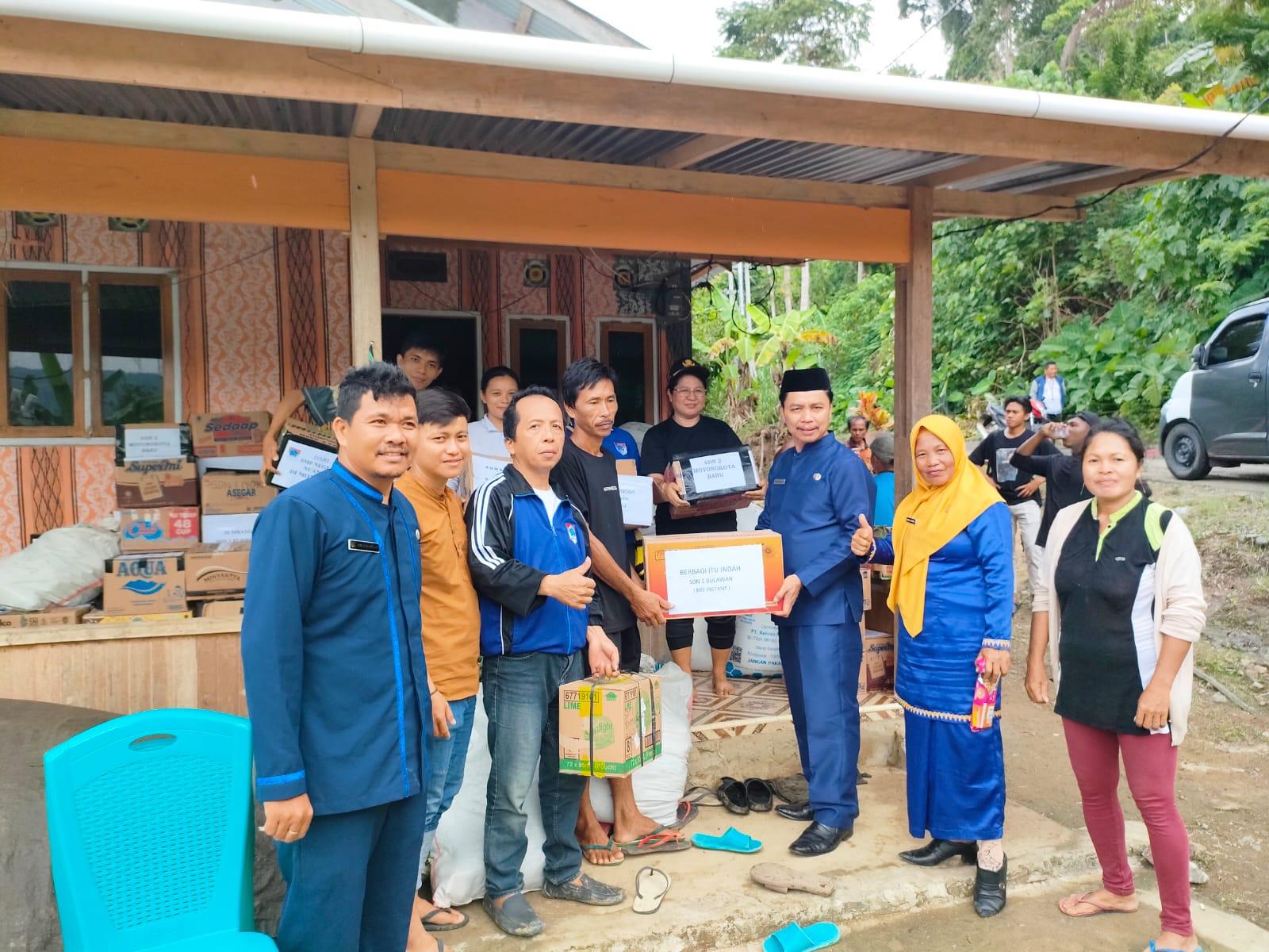 HUT ke 15 Boltim Sulawesi Utara, Para Guru Sumbang Sembako di Desa Jiko