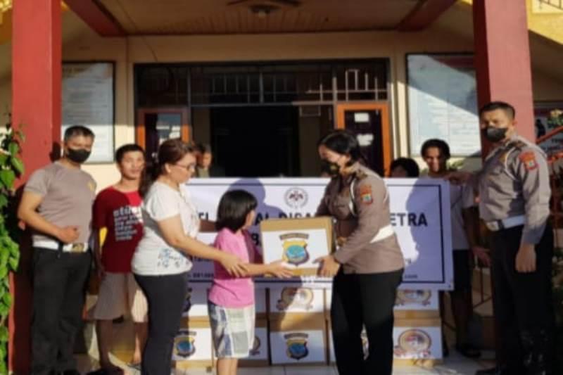 Hari Bhayangkara ke 76, Ditlantas Polda Sulut Salurkan Bansos di 3 Panti Asuhan