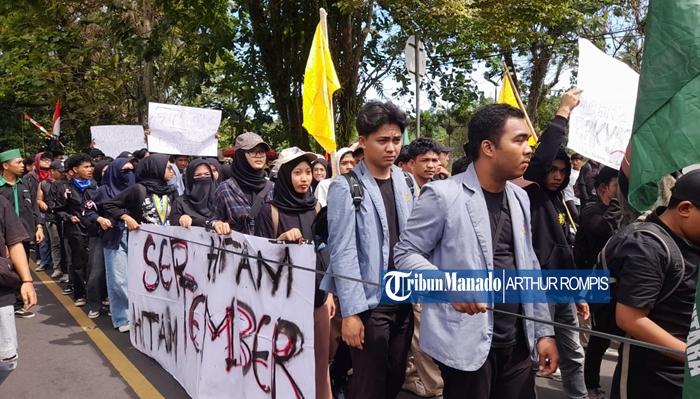Ribuan-mahasiswa-melakukan-unjuk-rasa-di-kantor-DPRD-Sulut-di-KelurahaHJHJ.jpg
