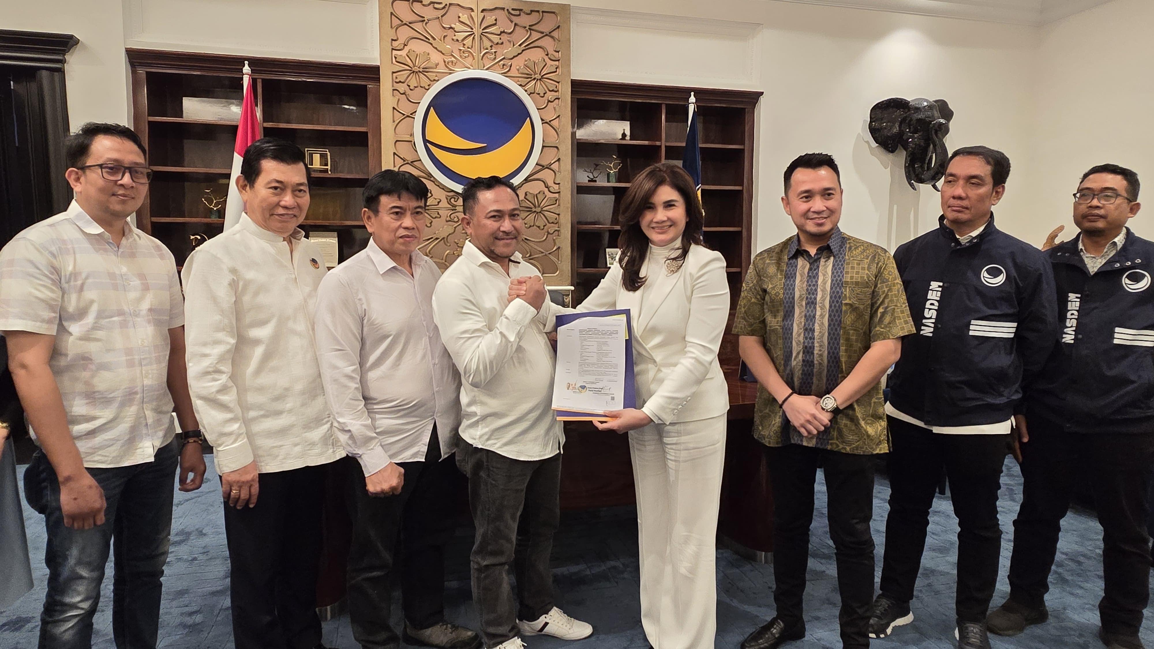 Sukron-Refly Terima SK B1KWK dari NasDem untuk Pilkada Bolmong Sulut