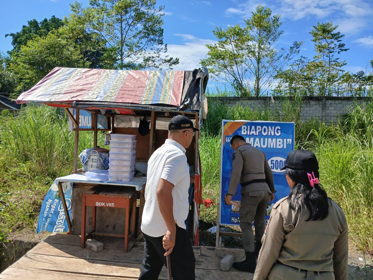 Tertibkan-Jualan-Satpol-PP-Minut-kembaliJHKLJHK.jpg