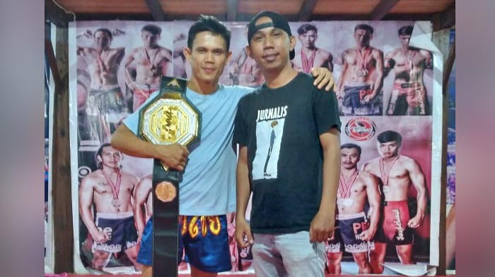 billy-pasulatan-juara-mma-asal-minahasa-utara-ingin-rebut-gelar-juara-kelas-berbeda.jpg