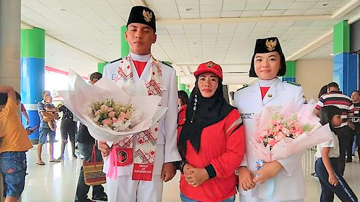 breaking-news-2-anggota-paskibraka-asal-sulut-initiba-di-bandara-sam-ratulangi-manado.jpg