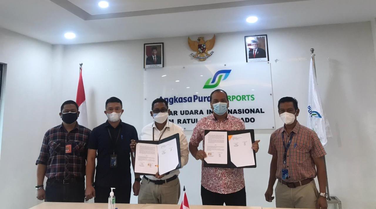 gm-pt-ap-i-bandara-samrat-manado-minggus-et-gandeguai-tandatangani-perjanjian-kerja-sama.jpg