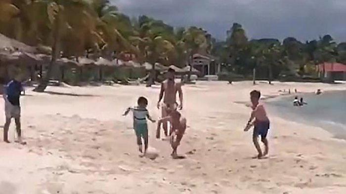 Kisah O'Neill Bocah yang Beruntung Bisa Bermain Sepak Bola dengan Lionel Messi saat Liburan - lionel-messi-bermain-sepak-bola-di-pantai-saat-liburan-di-antigua.jpg