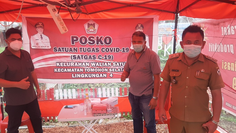 Warga Walian Satu Tomohon Gotong Royong Bantu Pasien yang Sedang Isolasi Mandiri