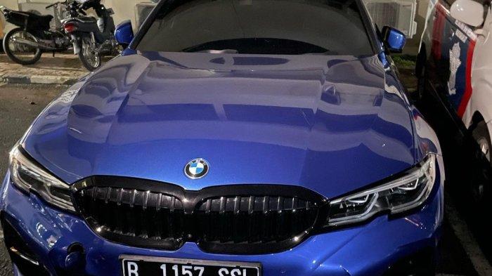 mobil-bmw-berpelat-nomor-b-1157-ssl-menabrak-anggota-polisi-lalu-lintas.jpg