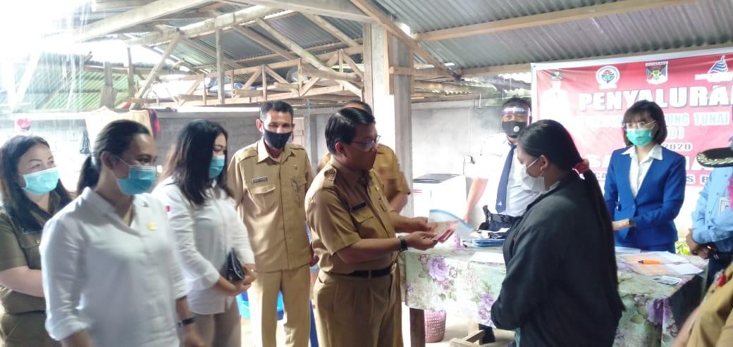 pemkab-minahasa-kembali-salurkan-blt-kali-ini-di-kecamatan-remboken.jpg