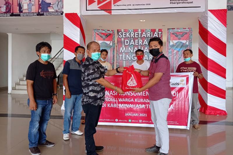 penyerahan-donasi-konsumen-alfamidi-berupa-bahan-pokok.jpg