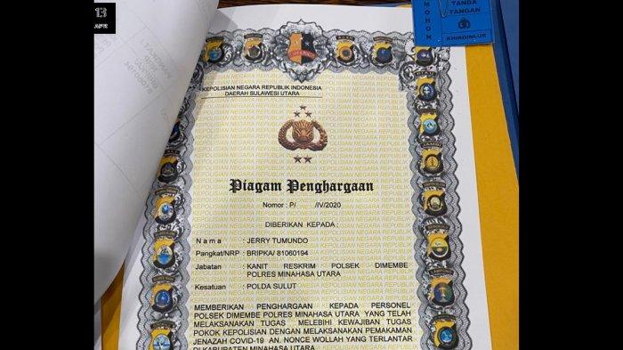 polisi-polsek-dimembe-yang-bantu-pemakamanjenazah-covid-19-dapat-piagam-diberi-tiket-oleh-kapolri.jpg