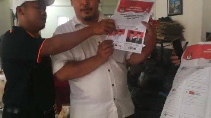 video-penggerebekan-yang-menunjukkan-ratusan-kantong-berwarna-hitam.jpg
