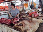 Aneke-Rakian-pedagang-daging-anjing-di-Pasar-Karombasan-Manado-Sulawesi-Utara.jpg