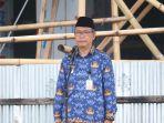 Asisten-III-Sekda-dr-Semuel-Raule-saat-menjadi-Irup-padaJGJGH.jpg