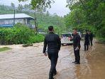 BANJIR-Banjir-yang-terjadi-di-desa-Mokupa-Kecamatan-Tombariri-MinahasaLO0.jpg