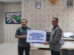 BRI-kantor-cabang-Manado-Sarapung-meyerahkan-bantuan-pembangunan-hjhgj.jpg