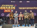 BSG-Direktur-Operasional-BSG-Louisa-Parengkuan-menerima-penghargaanLIO909.jpg