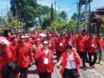 DPC-PDIP-Minahasa-jalan-kaki-menuju-KPU-dafar-bacalegfdjhfgjhgjghj.jpg