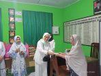 Foto-bersama-Dharma-Wanita-Bappeda-Bolmong-567.jpg