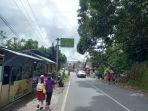 Foto-fis-Caption-jalan2-di-Minut-menuju-Likupang.jpg