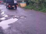 Kondisi-jalan-di-Jalan-Garuda-Kelurahan-Mogolaing-Kota-Kotamobagu-jghjghj.jpg