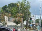 Lampu-jalan-di-Bitung-masih-menyala-meski-sudah-siang.jpg