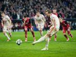 MENENDANG-PENALTI-Harry-Kane-menendang-penalti-pada-laga-Bayern.jpg