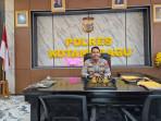 PERKELAHIAN-Kapolres-Kotamobagu-AKBP-Irwanto-saat-menjelaskan-terkait-bentrokklkio08.jpg