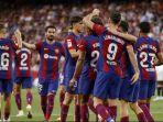 Para-pemain-Barcelona-saat-merayakan-goll.jpg