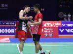 Pebulu-tangkis-tunggal-putra-Indonesia-Anthony-Sinisuka-Ginting-bersalaman-dengan-Kento-Momota.jpg