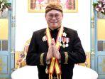 Penjabat-Pj-Bupati-Minahasa-Noudy-Tendean-menerima-penghargaan-kio78.jpg