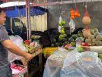 Penjual-buah-di-Pasar-Beriman-Kota-Tomohon-Sulawesi-Utara-Minggu-3112023-1-2-3.jpg