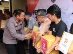 Polres-Kotamobagu-berbagi-kebahagiaan-dengan-masyarakatJGFJHF658GJGFJGFJ.jpg