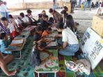 Putra-Putri-FKM-Usrat-melakukan-penyuluhan-kesehatan-kepada-anak-anak-di-Pasar-Bersehati-Manado.jpg