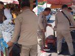 Satpol-PP-Kota-Manado-Sulawesi-Utara-melaksanakan-pgjghjghjghjj.jpg
