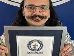 Simak-kisah-pria-yang-pecahkan-Guinness-World-Record-dengan-mempunyai-17-lubang-tindik-di-wajahnya.jpg