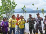 Sumber-foto-dari-Mahasiawa-IAKN-Manado-Caption-saat-penanaman-mangrove.jpg