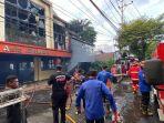 TERBAKAR-Kebakaran-besar-melanda-dua-unit-bangunan-di-Jalan-Ahmad-YaniLOP.jpg
