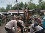 TNI-dan-Polri-turun-melakukan-kerja-bakti-di-lokasi-terdampak-bencana-lonsor-dan-banjir-di-Manado09.jpg