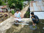 Wali-Kota-Bitung-Ir-Maurits-Mantiri-MM-memasang-jaringan-provider-di-titik-blank-spot89.jpg