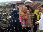 Bupati Yusra Alhabsyi Serahkan Dokumen Kependudukan Warga Terdampak Kebakaran Pasar Lolak Bolmong