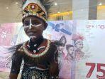 agustinus-rumere-9-tahun-salah-satu-dari-sembilan-anak-yang-wajahnya.jpg