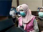 aksa-pinangki-sirna-malasari-menjalani-sidang-perdana-di-pengadilan-tipikor.jpg