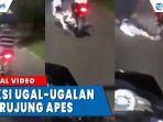 aksi-ugal-ugalan-pengendara-motor-berujung-apes-dfghh.jpg