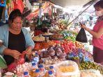 aktivitas-jual-beri-di-pasar-karombasan-kota-manado.jpg