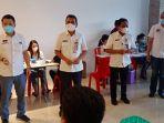 aprindo-sulut-menggelar-vaksinasi-masal-bagi-ratusan-pekerja-sektor-ritel-modern.jpg