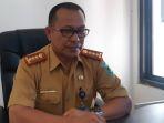 asisten-i-bidang-pemerintahan-setda-kabupaten-bolmong-deker-rompas-6767hgfh.jpg