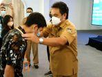 assisten-bidang-perekonomian-dan-pembangunan-sekdakab-minahasa-ir-wenny-talumewo-msi-gfhgfhgf687.jpg