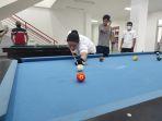 atlet-billiar-sulut-claudia-warouw-dan-daniel-pascoal-menjalani-latihan-dalam-pelatda-pon-sulut.jpg