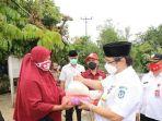 bantuan-sembako-dari-pemkab-bolsel.jpg