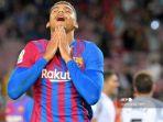 bek-barcelona-asal-uruguay-ronald-araujo-bereaksi-selama-pertandingan-sepak-bola-liga-spanyol.jpg